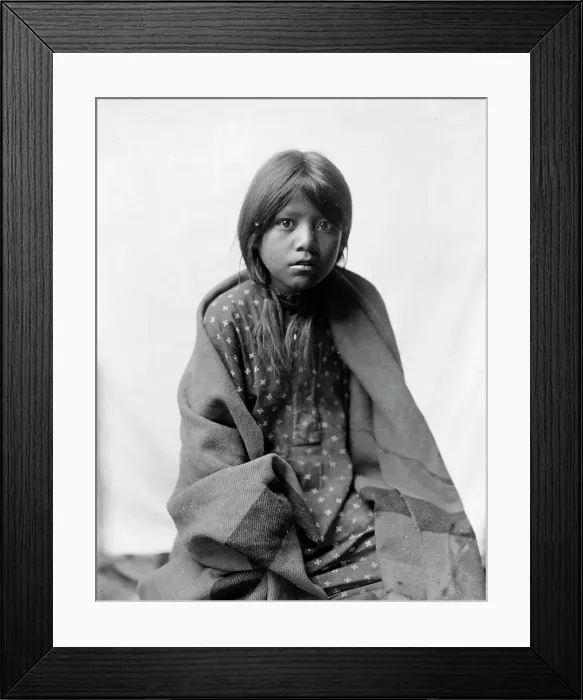Framed Print : A Taos girl, three-quarter length portrait, seated, facing front, c1905. Creator: Edward Sheriff Curtis Framed Print : A Taos girl, three-quarter length portrait, seated, facing front, c1905. Creator: Edward Sheriff Curtis