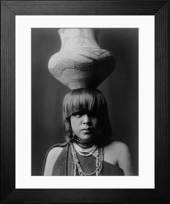 Framed Print : Girl and jar-San Ildefonso, c1927. Creator: Edward Sheriff Curtis Framed Print : Girl and jar-San Ildefonso, c1927. Creator: Edward Sheriff Curtis