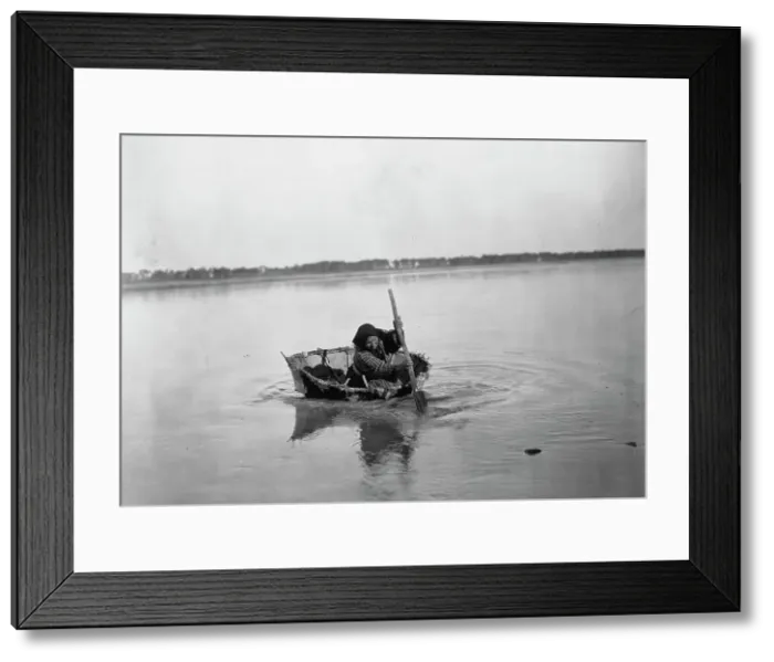 Framed Print : Mandan bull boat, c1908. Creator: Edward Sheriff Curtis Framed Print : Mandan bull boat, c1908. Creator: Edward Sheriff Curtis