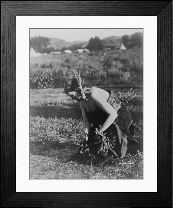 Framed Print : Offering the pipe to the Earth-Cheyenne, c1910. Creator: Edward Sheriff Curtis