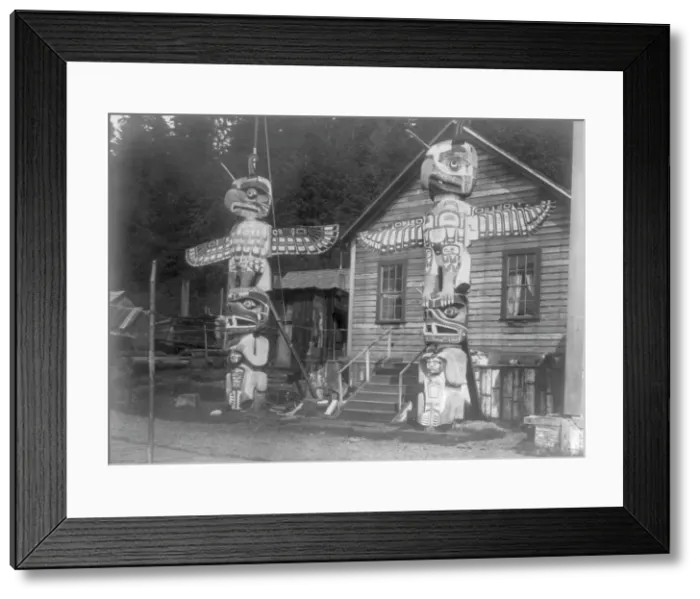 Framed Print : Carved posts at Alert Bay, c1914. Creator: Edward Sheriff Curtis Framed Print : Carved posts at Alert Bay, c1914. Creator: Edward Sheriff Curtis