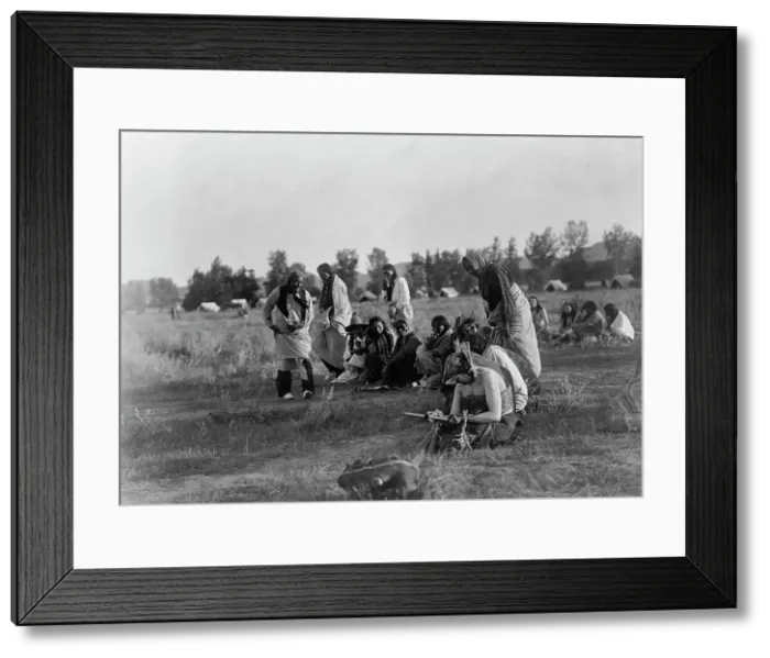 Framed Print : Priests passing before the pipe-Cheyenne, c1910. Creator: Edward Sheriff Curtis Framed Print : Priests passing before the pipe-Cheyenne, c1910. Creator: Edward Sheriff Curtis
