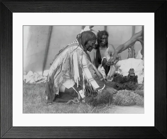Framed Print : Saliva, Slow Bull (in background), Picket Pin's arm, c1907. Creator: Edward Sheriff Curtis Framed Print : Saliva, Slow Bull (in background), Picket Pin's arm, c1907. Creator: Edward Sheriff Curtis