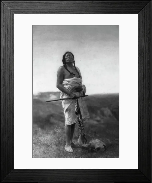Framed Print : The Medicine Man (Slow Bull), c1907. Creator: Edward Sheriff Curtis Framed Print : The Medicine Man (Slow Bull), c1907. Creator: Edward Sheriff Curtis