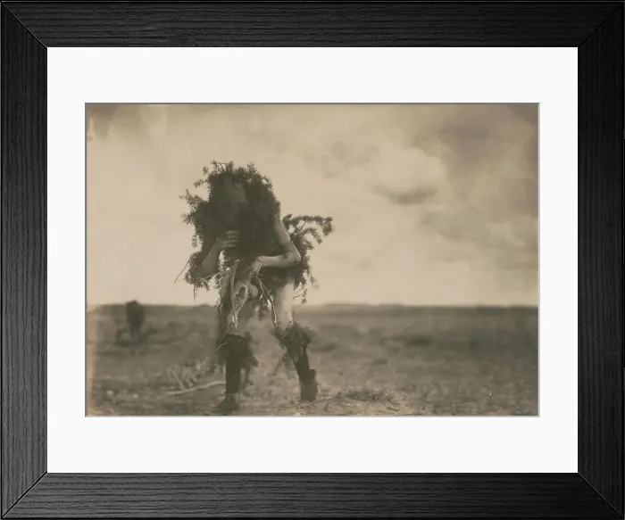 Framed Print : Yeibichai, the beggar, Tonenili-Navajo Indian, dressed in spruce branches, 1904, c1905. Creator: Edward Sheriff Curtis Framed Print : Yeibichai, the beggar, Tonenili-Navajo Indian, dressed in spruce branches, 1904, c1905. Creator: Edward Sheriff Curtis