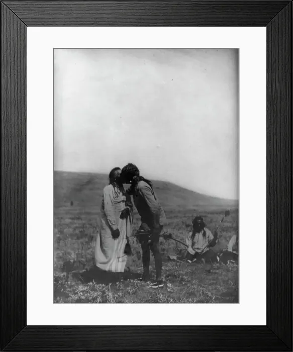 Framed Print : Atsina crazy dance-[A dancer kisses the grandfather], c1908. Creator: Edward Sheriff Curtis