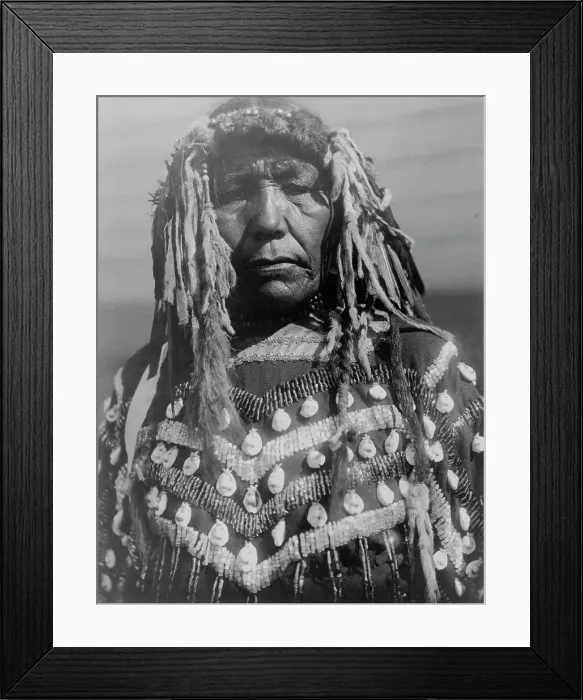 Framed Print : Piegan woman, c1910. Creator: Edward Sheriff Curtis Framed Print : Piegan woman, c1910. Creator: Edward Sheriff Curtis