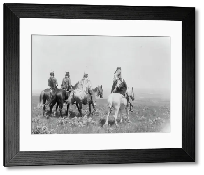 Framed Print : The chief and his staff, Apsaroke Indians, c1905. Creator: Edward Sheriff Curtis Framed Print : The chief and his staff, Apsaroke Indians, c1905. Creator: Edward Sheriff Curtis