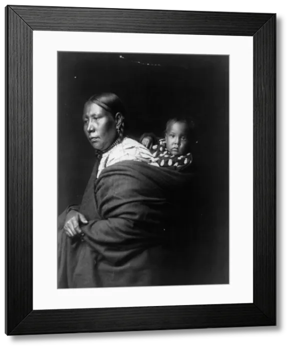 Framed Print : Mother and child-Ogalala, c1905. Creator: Edward Sheriff Curtis Framed Print : Mother and child-Ogalala, c1905. Creator: Edward Sheriff Curtis