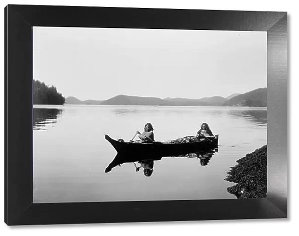Canoeing on Clayquot Sound, c1910. Creator: Edward Sheriff Curtis