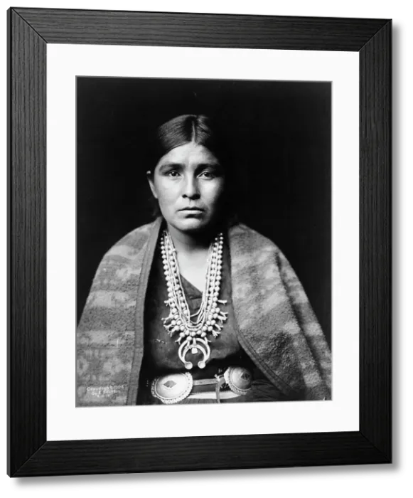 Framed Print : Head-and-shoulders portrait of Navajo woman, facing front, c1904. Creator: Edward Sheriff Curtis Framed Print : Head-and-shoulders portrait of Navajo woman, facing front, c1904. Creator: Edward Sheriff Curtis