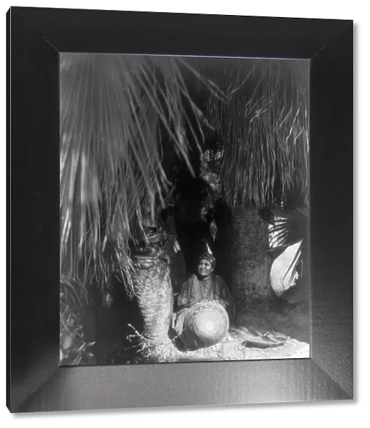 Under the palms-Cahuilla, 1905, c1924. Creator: Edward Sheriff Curtis