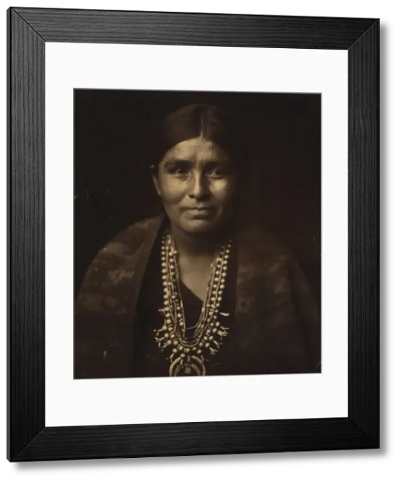 Framed Print : A Navaho woman, c1904. Creator: Edward Sheriff Curtis Framed Print : A Navaho woman, c1904. Creator: Edward Sheriff Curtis