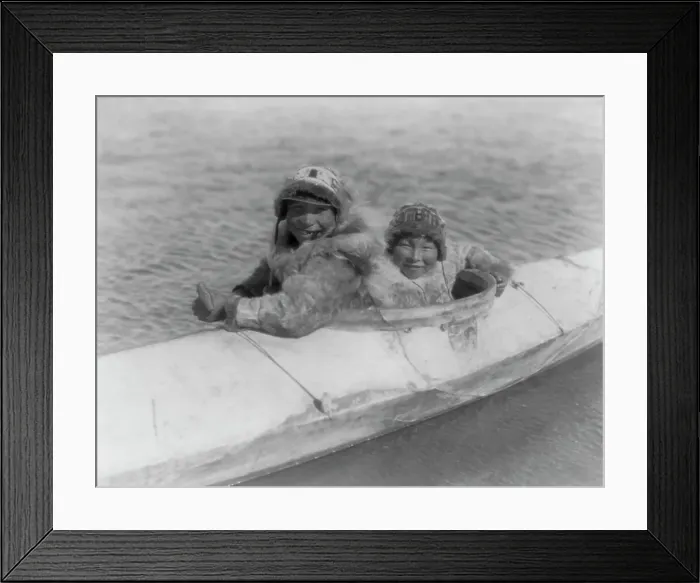 Framed Print : Boys in a kaiak (i.e. kayak)-Nunivak, c1929. Creator: Edward Sheriff Curtis Framed Print : Boys in a kaiak (i.e. kayak)-Nunivak, c1929. Creator: Edward Sheriff Curtis
