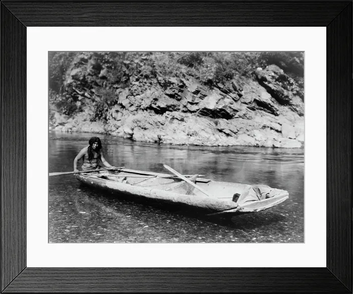 Framed Print : Yurok canoe on Trinity River, c1923. Creator: Edward Sheriff Curtis