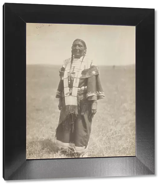 Spotted Eagle's wife, 1907. Creator: Edward Sheriff Curtis