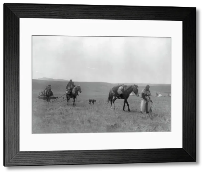 Framed Print : The pipe-bearer-Atsina, c1908. Creator: Edward Sheriff Curtis Framed Print : The pipe-bearer-Atsina, c1908. Creator: Edward Sheriff Curtis