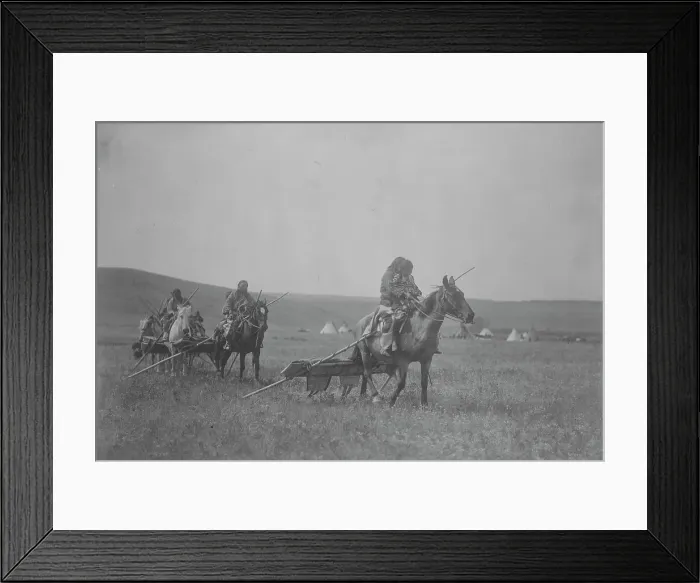 Framed Print : Moving camp-Atsina, c1908. Creator: Edward Sheriff Curtis Framed Print : Moving camp-Atsina, c1908. Creator: Edward Sheriff Curtis