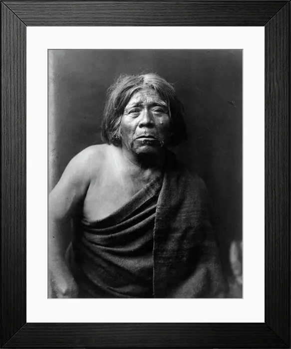 Framed Print : Mat Stams-Maricopa, half-length portrait, facing front, wrapped in blanket, c1907. Creator: Edward Sheriff Curtis Framed Print : Mat Stams-Maricopa, half-length portrait, facing front, wrapped in blanket, c1907. Creator: Edward Sheriff Curtis