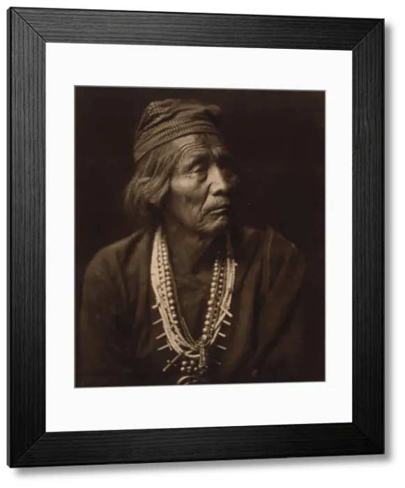Framed Print : Nesjaja Hatali - Navaho, c1904. Creator: Edward Sheriff Curtis Framed Print : Nesjaja Hatali - Navaho, c1904. Creator: Edward Sheriff Curtis