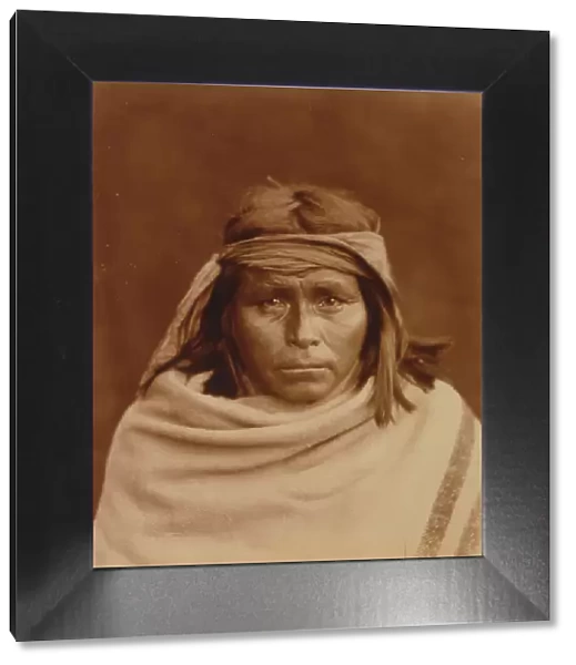 Tah-Lay, Apache? Indian, head-and-shoulders portrait, facing front, wearing blanket and... c1903. Creator: Edward Sheriff Curtis