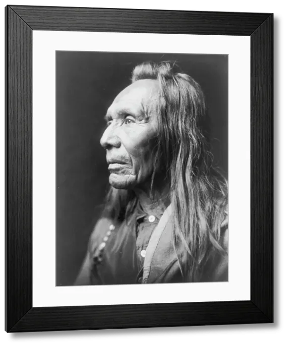 Framed Print : Three Eagles, a Nez Percé Indian, head-and-shoulders portrait, facing left, c1910. Creator: Edward Sheriff Curtis Framed Print : Three Eagles, a Nez Percé Indian, head-and-shoulders portrait, facing left, c1910. Creator: Edward Sheriff Curtis