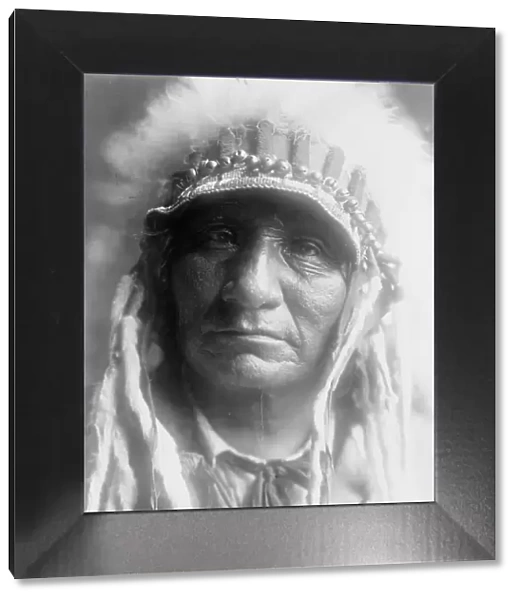 Red Hawk (Che-tan Luta)-Oglala, c1907. Creator: Edward Sheriff Curtis
