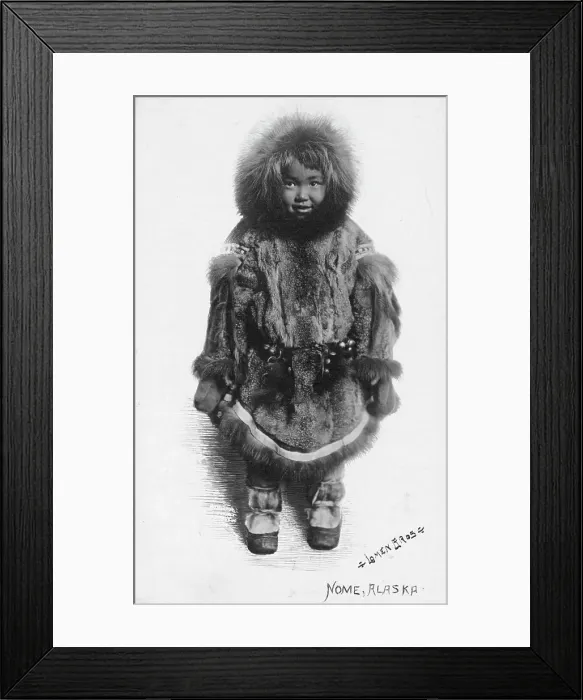 Framed Print : Child in fur outfit, between c1900 and c1930. Creator: Lomen Brothers