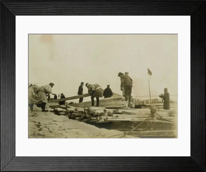 Framed Print : Japanese removing timbers from lighters at Chemulpo for erection of runways, c1904. Creator: Robert Lee Dunn Framed Print : Japanese removing timbers from lighters at Chemulpo for erection of runways, c1904. Creator: Robert Lee Dunn