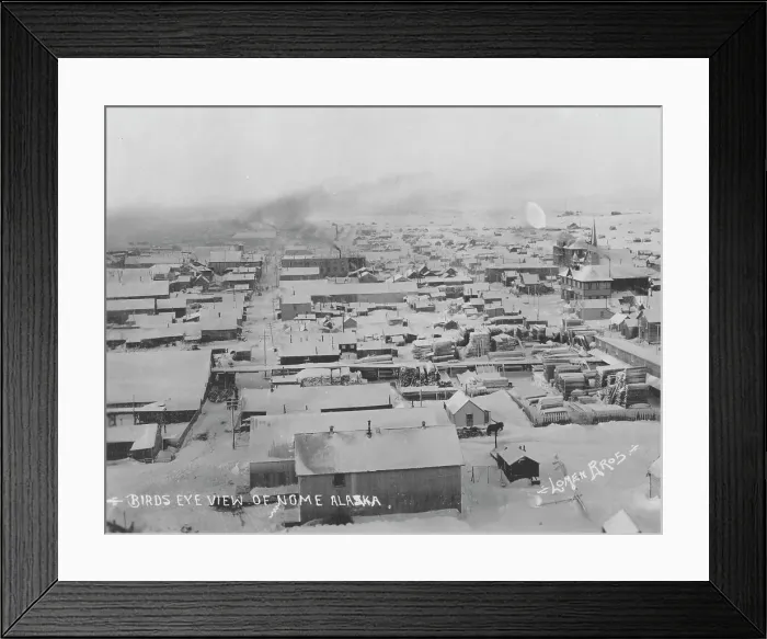 Framed Print : Bird's eye view of Nome with snow, between c1900 and c1930. Creator: Lomen Brothers Framed Print : Bird's eye view of Nome with snow, between c1900 and c1930. Creator: Lomen Brothers