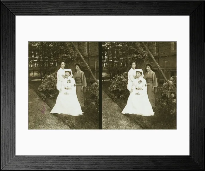 Framed Print : A western Red Cross female doctor(?) and two Japanese women posed in a garden, c1905. Creator: Underwood & Underwood. A western Red Cross female doctor(?) and two Japanese women posed in a garden, c1905. Creator: Underwood & Underwood