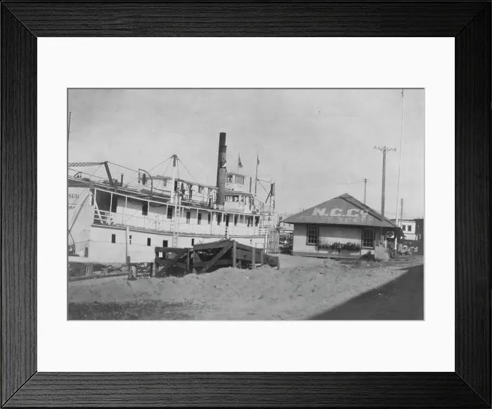 Framed Print : Boat docked at N.C. Co. between c1900 and 1916. Creator: Unknown Framed Print : Boat docked at N.C. Co. between c1900 and 1916. Creator: Unknown