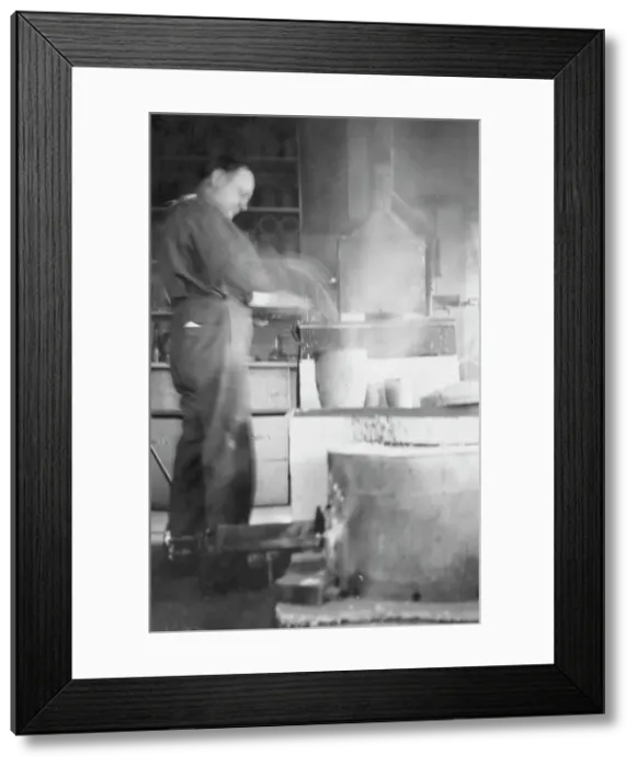 Framed Print : Mr. Kah smelting gold at the Assay Office, between c1900 and 1916. Creator: Unknown Framed Print : Mr. Kah smelting gold at the Assay Office, between c1900 and 1916. Creator: Unknown