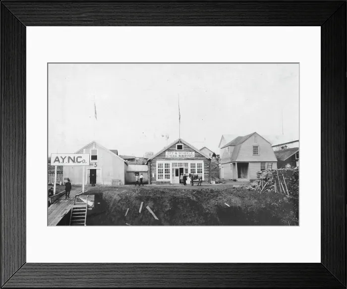 Framed Print : Scene in front of Ott and Scheele's general merchandise store, between c1900 and 1916. Creator: Unknown Framed Print : Scene in front of Ott and Scheele's general merchandise store, between c1900 and 1916. Creator: Unknown