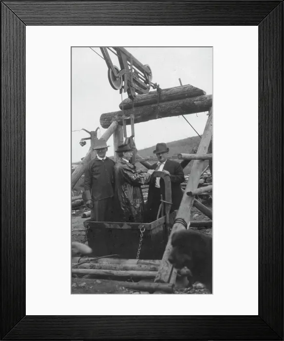 Framed Print : Frank G. Carpenter in middle of bucket at gold mine, between c1900 and 1916. Creator: Unknown Framed Print : Frank G. Carpenter in middle of bucket at gold mine, between c1900 and 1916. Creator: Unknown