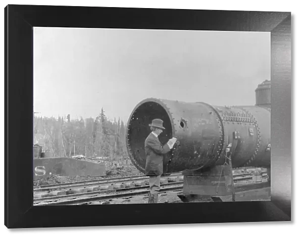 Frank G. Carpenter inspecting new railroad, between c1900 and 1916. Creator: Unknown