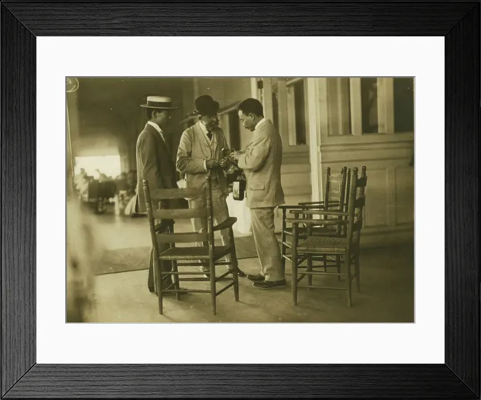 Framed Print : Two Japanese men and one American(?) man, probably journalists, conversing on the veranda... 1905. Creator: Unknown Framed Print : Two Japanese men and one American(?) man, probably journalists, conversing on the veranda... 1905. Creator: Unknown
