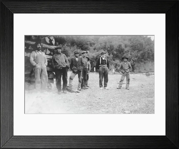 Framed Print : Men next to logs, between c1900 and 1916. Creator: Unknown Framed Print : Men next to logs, between c1900 and 1916. Creator: Unknown