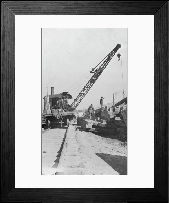 Framed Print : Crane being used in construction of new railway bridge, between c1900 and c1930. Creator: Unknown Framed Print : Crane being used in construction of new railway bridge, between c1900 and c1930. Creator: Unknown