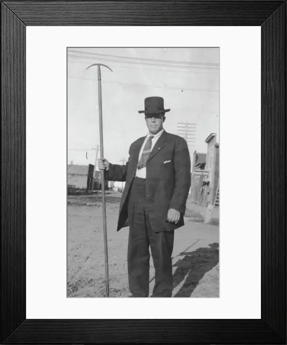Framed Print : Man holding a tool, between c1900 and 1916. Creator: Unknown Framed Print : Man holding a tool, between c1900 and 1916. Creator: Unknown