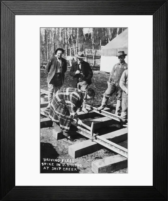 Framed Print : Babe White driving first spike in U.S. Railroad, between c1900 and c1930. Creator: Unknown Framed Print : Babe White driving first spike in U.S. Railroad, between c1900 and c1930. Creator: Unknown