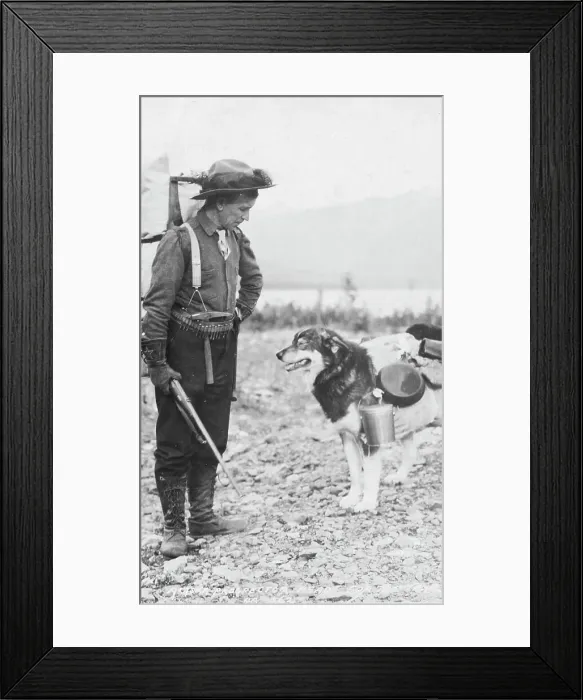 Framed Print : Prospector and dog ready for the summer trail, between c1900 and c1930. Creator: Unknown Framed Print : Prospector and dog ready for the summer trail, between c1900 and c1930. Creator: Unknown