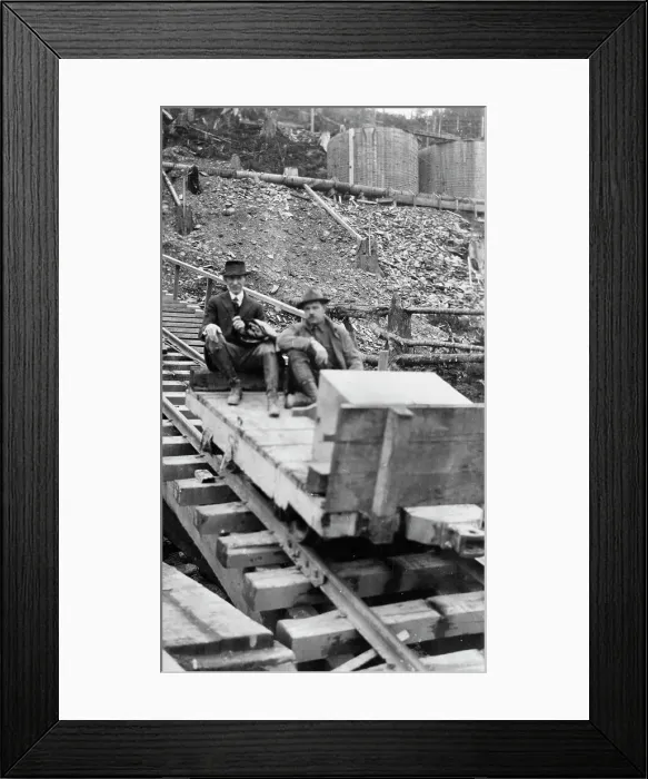 Framed Print : Frank G. Carpenter and man sitting on tracks, between c1900 and 1924. Creator: Unknown Framed Print : Frank G. Carpenter and man sitting on tracks, between c1900 and 1924. Creator: Unknown
