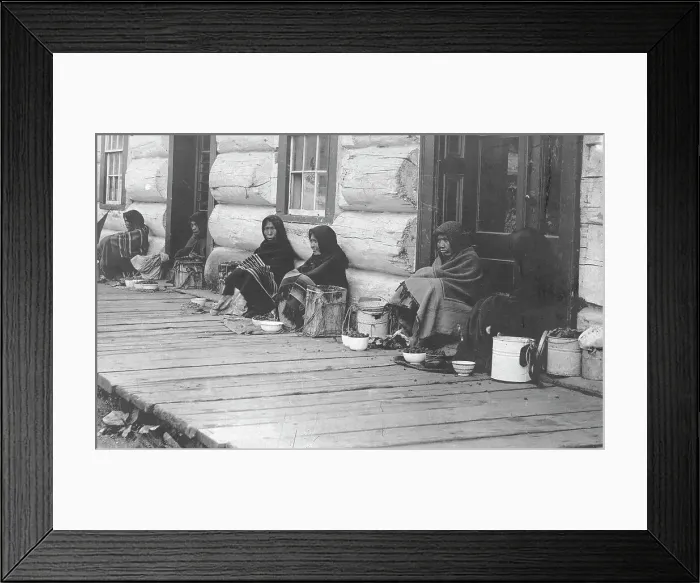 Framed Print : Indians sitting with backs to wall selling berries, between c1900 and c1930. Creator: Unknown Framed Print : Indians sitting with backs to wall selling berries, between c1900 and c1930. Creator: Unknown