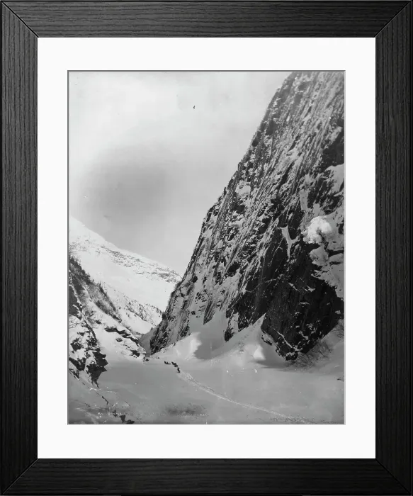 Framed Print : Men traveling with horses through snow covered valley, between c1900 and c1930. Creator: Unknown Framed Print : Men traveling with horses through snow covered valley, between c1900 and c1930. Creator: Unknown