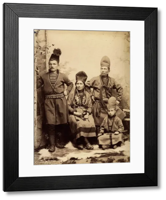 Framed Print : Group picture with four people wearing Sami folk costumes, 1912. Creator: Helene Edlund Framed Print : Group picture with four people wearing Sami folk costumes, 1912. Creator: Helene Edlund