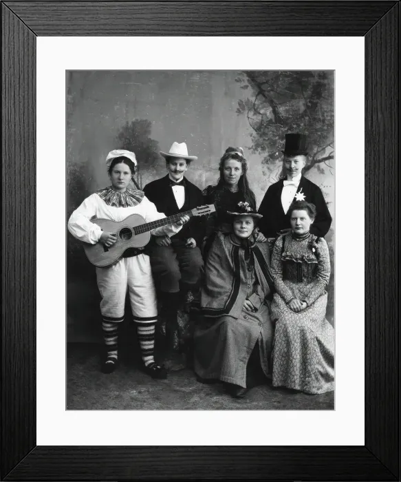 Framed Print : Six dressed-up youngsters, one of the young people plays the guitar, 1910-1920. Creator: Hans Per Persson Framed Print : Six dressed-up youngsters, one of the young people plays the guitar, 1910-1920. Creator: Hans Per Persson