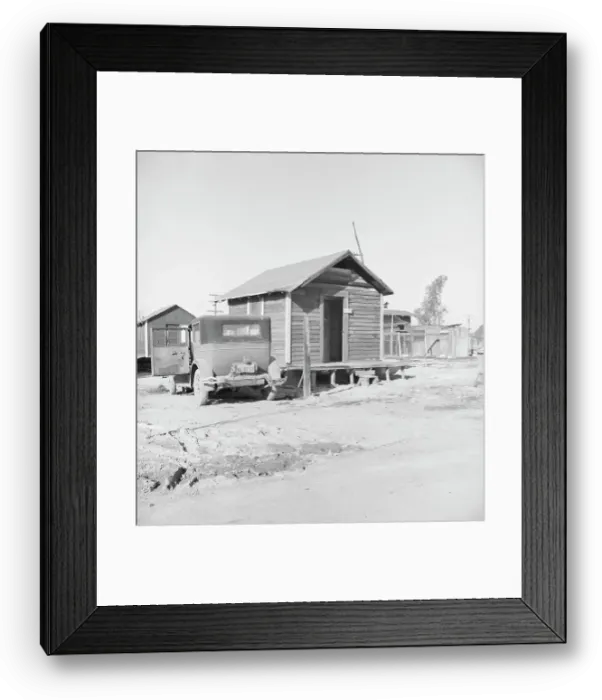 Framed Print : Newly-built cabins, rent five dollars per month, near Bakersfield, California, 1939. Creator: Dorothea Lange Framed Print : Newly-built cabins, rent five dollars per month, near Bakersfield, California, 1939. Creator: Dorothea Lange