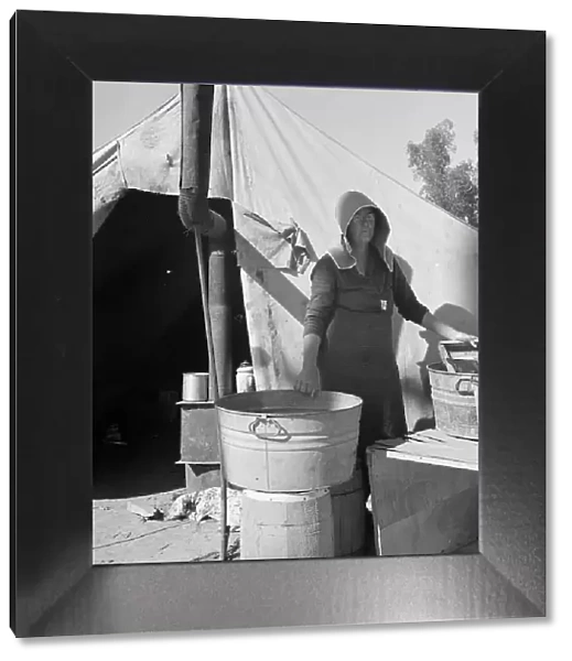 Texas woman in carrot pullers camp, Imperial Valley, California, 1939. Creator: Dorothea Lange