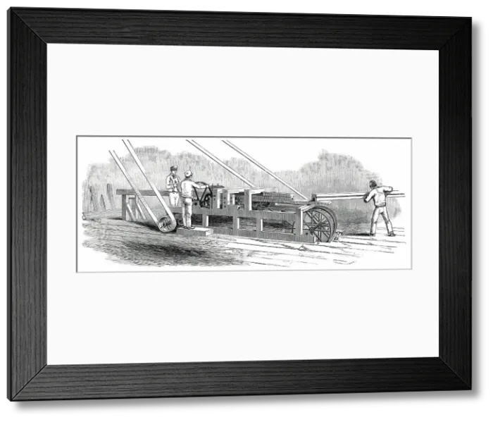 Framed Print : The Great Exhibition Building in Hyde Park - the Gutter-Cutting Machine, 1850. Creator: Unknown Framed Print : The Great Exhibition Building in Hyde Park - the Gutter-Cutting Machine, 1850. Creator: Unknown